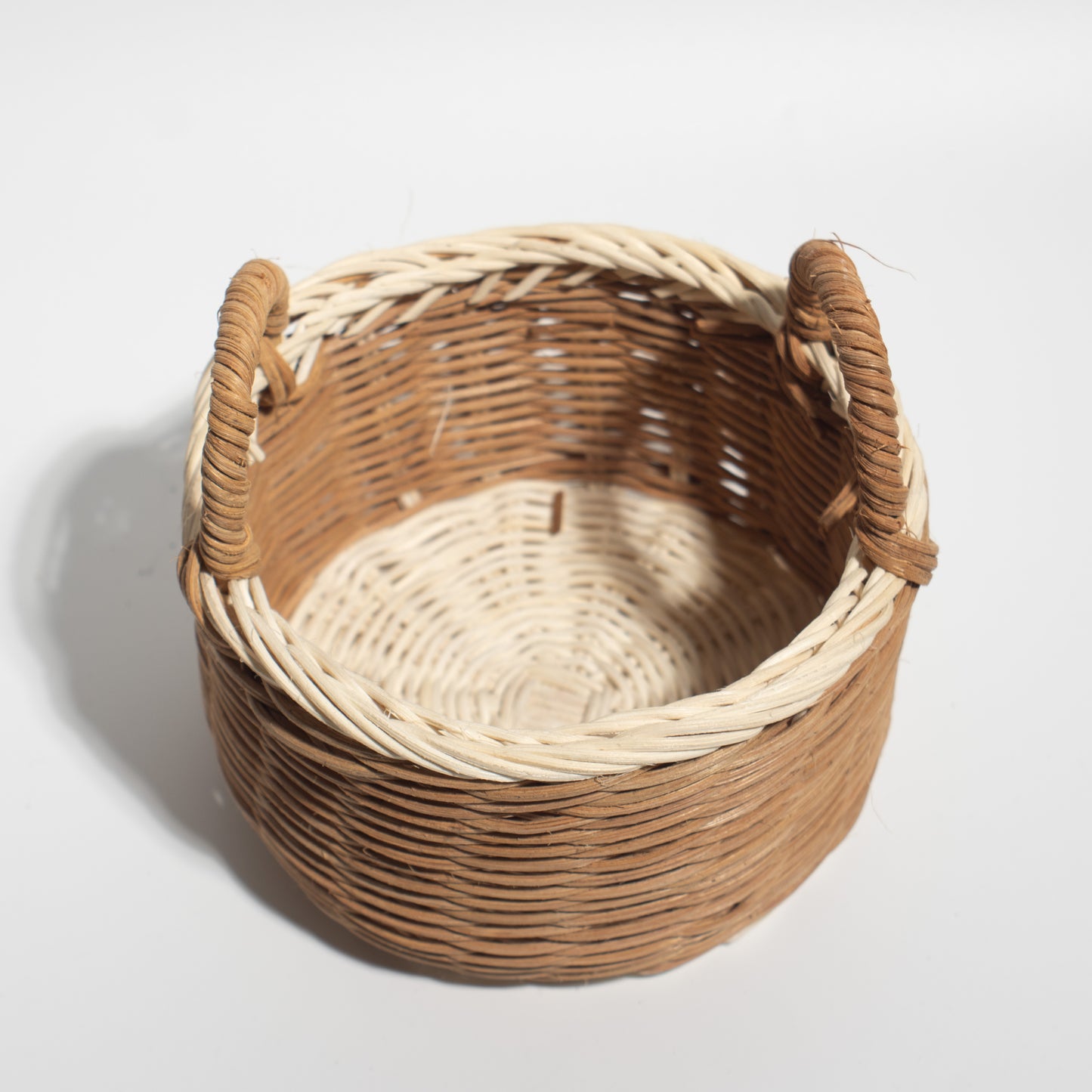 rattan basket Ideal for flower arrangements, storing small items, or as a decorative accent in any room.