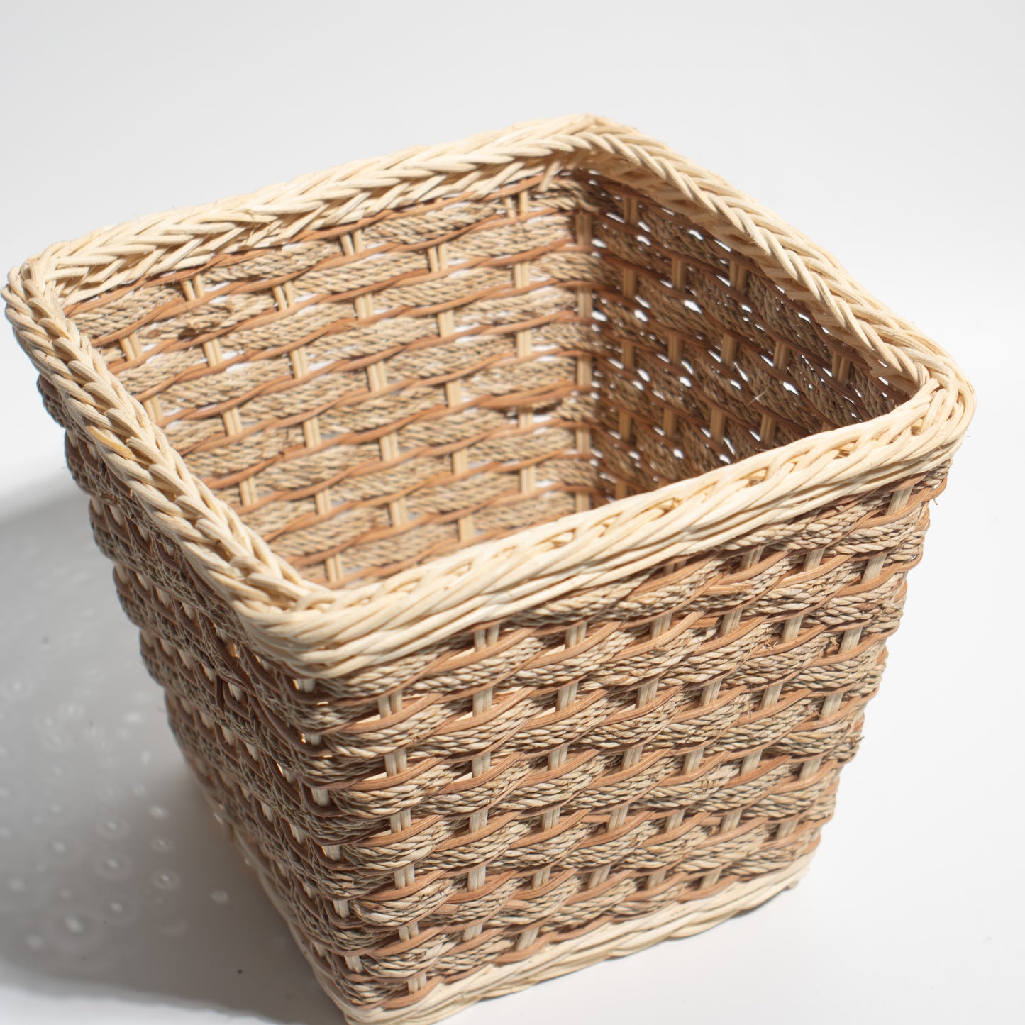 small rattan basket The perfect size for flower arrangements, storing small items, toys, stationery, or accessories.